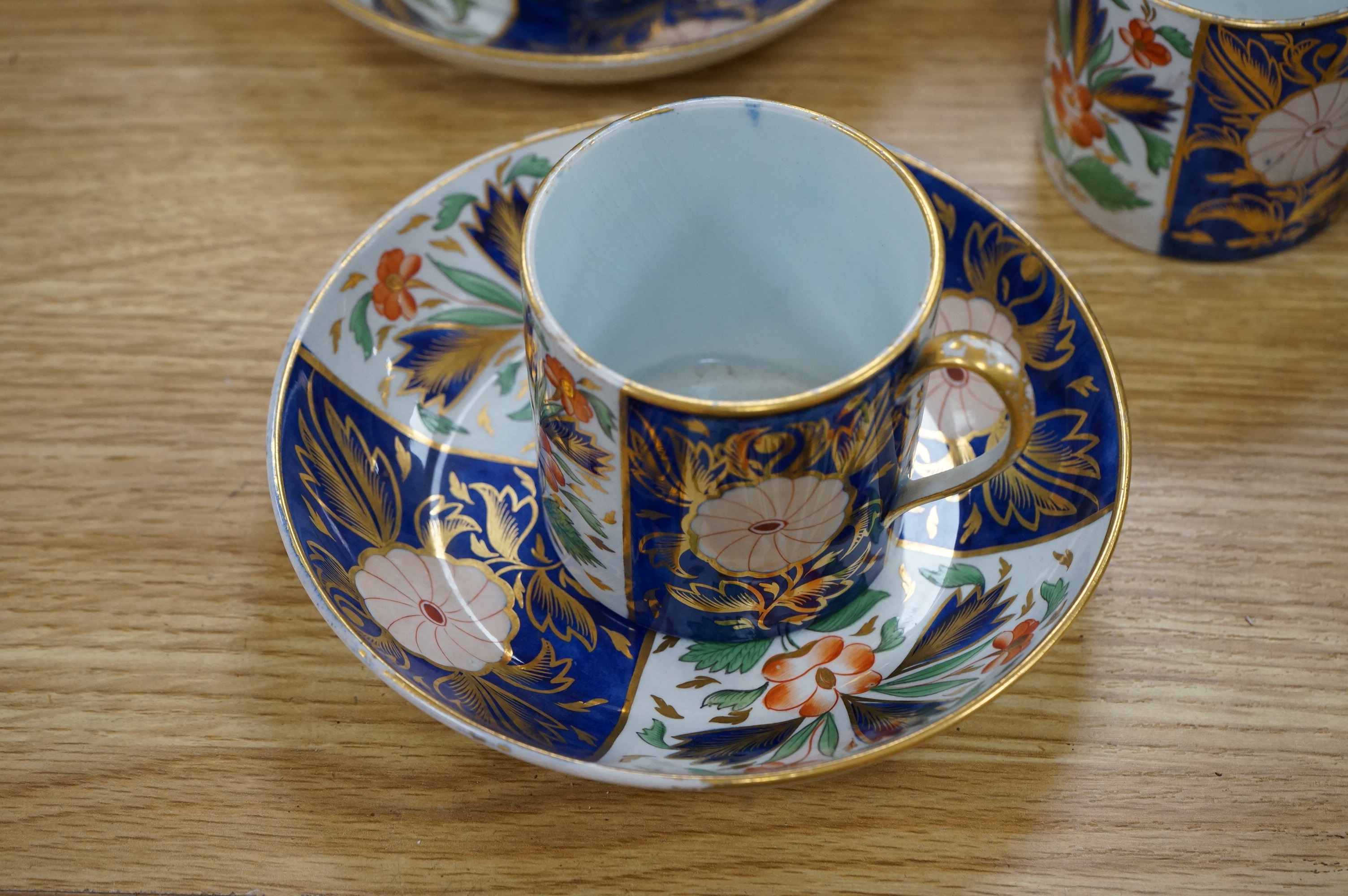 A Wedgwood Queensware Imari part tea set and a Masons Imari pattern bowl, bowl 25.5cm diameter. Condition - some wear to gilt decoration and crazing to interior of jug